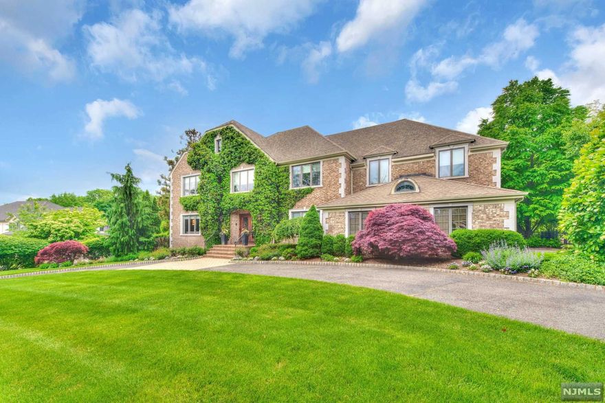 Stunning, recently renovated 6 bedroom, 6.5 bath home on a quiet Cul-de-Sac beautifully designed and decorated by an interior designer. Enter into a welcoming 2-story foyer with bridal staircase. The Living/Billiard room offers a marble fireplace and coffered ceiling. The Dining room has custom millwork and french doors. A beautiful 2020's renovated gourmet eat-in kitchen is the heart of the home. A great room with vaulted ceiling/fireplace/wet bar, sun room, powder room and 1st floor bedroom suite/office complete the 1st floor. The 2nd floor boasts a master bedroom suite with a fireplace and retail style walk-in closet, and 4 additional Bedrooms, 3 of which are ensuite. The Basement is finished with a gym, rec room, office and full bath. Professionally landscaped, resort-like backyard is an entertainer's delight with 2021 built in BBQ, refrigerator, and a newly refurbished heated inground gunite Pool. Backyard borders undevelopable land providing the ultimate privacy.