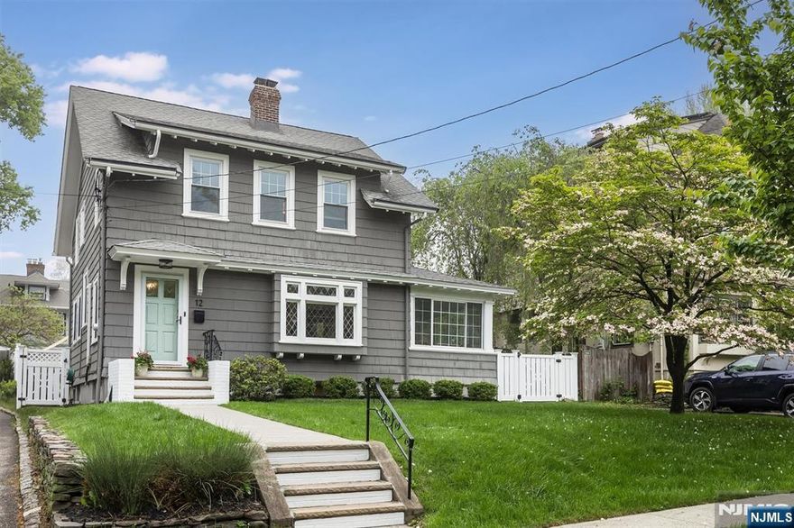 Summer living is easy in this light filled artist's home perfectly positioned in one of Montclair's most central locations. Enjoy the best of Montclair life- just moments from the vibrant Watchung Plaza village with NYC direct train service, even closer to the bus to the city, near the scenic beauty of Edgemont Park and Anderson Park, plus the charm of Upper Montclair's restaurants, boutiques and coffee shops. Out back, spend summer days by the heated salt water pool -ideal for relaxing, entertaining or play. The pool safety fence is thoughtfully included. Inside, the formal living room features coffered ceilings, leaded glass windows and wood burning fireplace. Newly installed wood floors span both the first and second levels, adding warmth and style. The sun-drenched studio/sunroom wrapped in windows offers an inspiring space for work or leisure. A newly renovated kitchen includes quartz counters, stainless appliances, and a brand new Bosch dishwasher and fridge. An adjacent butler's pantry provides additional storage.The dining room, with a charming window seat, connects seamlessly to a mudroom area and small porch overlooking the gorgeous backyard. The fully finished, waterproofed basement includes a renovated full bath and easy outdoor access- perfect for post-pool cleanup. This home is designed for comfort,creativity and connection to everything that makes Montclair so special. Do not miss your chance to experience it!