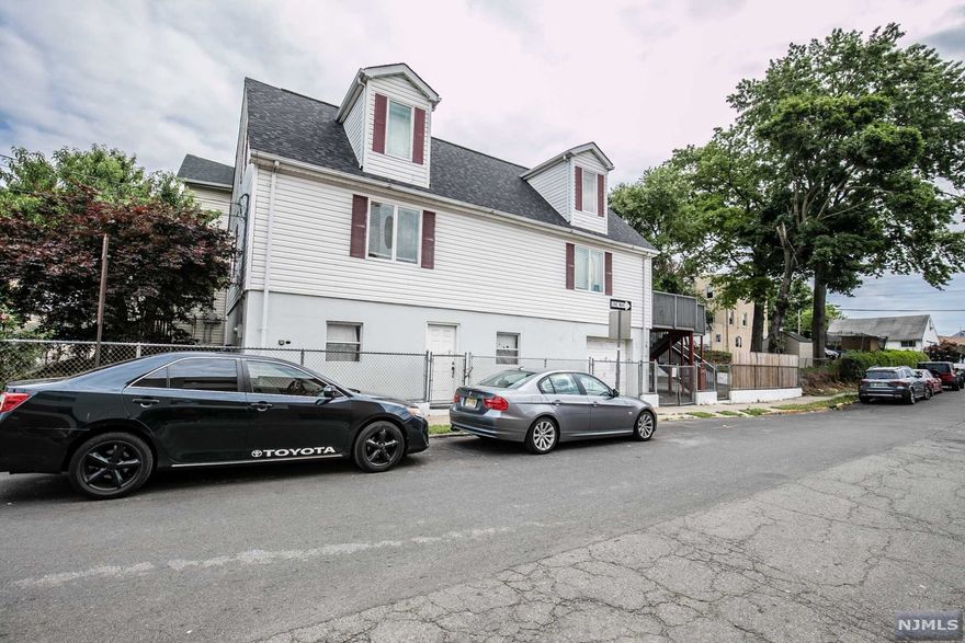 Recently renovated 2022, new kitchen, cabinets, floor and bathroom. The 2nd floor offers a large living room with 2 bedrooms & bathroom in addition 2 more bedrooms on the top floor and bathroom. The 1st floor has a great opportunity to customize to your needs with materials included. (see pictures) The home is located on a corner lot with easy access to major highways and the ability to park inside the driveway. Most of all, this home is spacious with the ability to have separate living spaces or convert into a 2 family.