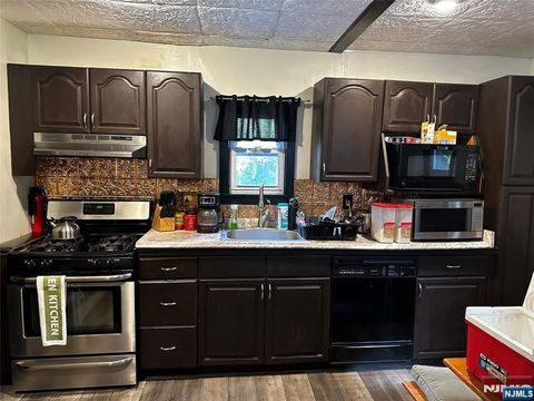 Photo of 458 Walnut Street, East Orange, NJ 07017 (MLS # 25039273)