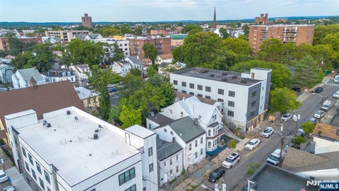 Photo of 63 Pearl Street, Paterson, NJ 07501 (MLS # 26035036)