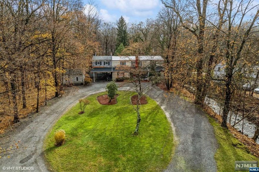 Discover the unique blend of history and opportunity at 270 Pascack Rd, a magnificent colonial home nestled on a 3/4-acre lot in the scenic Woodcliff Lake. This 4150 sqft property is not just a house, it's a piece of American history. Once serving as the Doremus' Hotel, hosting a Civil War reunion! The home features 10 spacious rooms, including 6 bedrooms and 2.5 baths, each echoing stories of a bygone era. The true value of this property lies in its potential. Whether you're drawn to restoring its colonial grandeur or transforming it into a modern dream home, the expansive land and the house's versatile layout provide a perfect canvas. The location of Woodcliff Lake enhances the appeal, with its natural beauty, tranquil community, and convenient amenities. *PLEASE SUBMIT OFFERS BY WEDNESDAY 5/8 AT 5PM* PRICE SUBJECT TO 3rd PARTY APPROVAL.