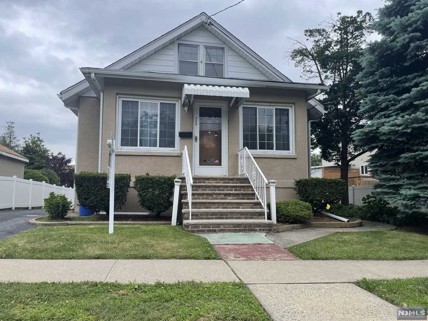Welcome to the quiet suburb of Carlstadt, with low taxes, lots of parks, and close to everything! This charming home has 2 large bedrooms on the first floor, full bath, and beautiful natural wood trim throughout the living room and dining room. The second floor has lots of storage space and 2 more bedrooms. The basement has lots of options to finish off and make it your own. It's a commuters dream! NYC transportation right outside your front door! Come see it