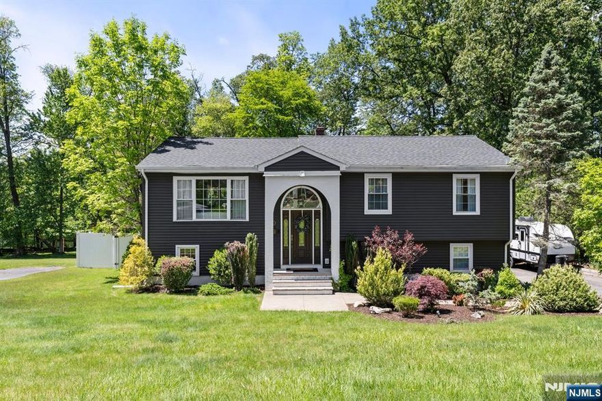 Welcome to this beautifully updated home with charming curb appeal and a well-maintained exterior. Renovations began in 2020, updating nearly every room with modern finishes and comfortable living spaces. New appliances were added that year, followed by a roof in 2022 and windows replaced between 2020 and 2024. The downstairs furnace and central A/C were replaced in 2023 for year-round comfort. Upstairs features a bright living room, dining area, and renovated eat-in kitchen. Down the hall are a fully updated bathroom and three bedrooms, including a spacious primary bedroom with private en-suite. The lower level has a cozy bedroom, full bath, and a large family room featuring two sliding doors to a covered patio and backyardâ€”perfect for relaxing or entertaining. The three-car garage includes one bay converted into a finished bonus room, ideal for office, gym, or creative space. The large, fully fenced backyard invites you to enjoy gardening or gatherings in peace. Please have all offers in by June 4th.