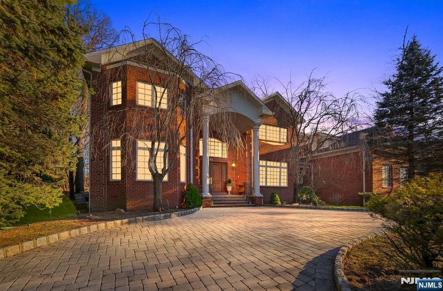 Nestled in the highly desired and prestigious town of North Caldwell NJ, this Magnificent home combines timeless elegance, regal sophistication and comfort. Spanning an expansive floor plan, this residence boasts 6 generously sized bedrooms, including a first-floor bedroom offering convenience and privacy. The home is outfitted with 7 full baths and 2 half baths, each beautifully designed with premium finishes and materials with exceptional quality. The main level boasts a sumptuous sixth bedroom and bath perfect for guests. The awe-inspiring kitchen, a culinary enthusiast's dream, is adorned with top-tier appliances, a Subzero refrigerator and Miele fixtures. Glass doors seamlessly connect the kitchen to a 29-foot family room, bathed in natural light from large windows and French doors leading to the patio. Descend to the basement, a world of entertainment and relaxation. A dedicated play area, a state-of-the-art exercise room, an inviting entertainment room, a professional bar, a wine cellar, a cinematic theater and a billiards room. With its prime location and impeccable pride of ownership, this stunning home is a true masterpiece ideal for those seeking both comfort and luxury. Located conveniently miles from the City of New York, Montclair, Universities, Transportation, Restaurants and Dining, Shopping and much more!