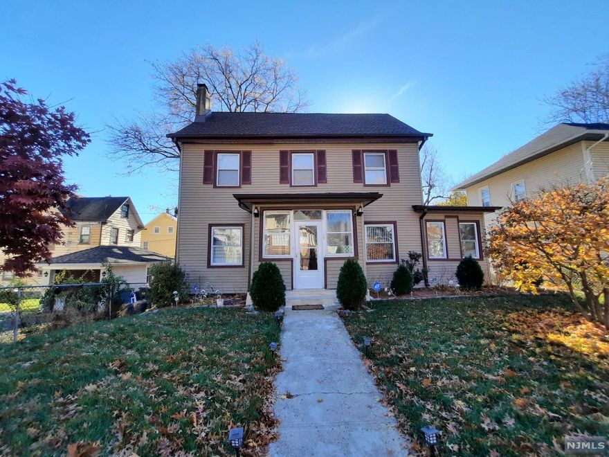 Beautiful move in condition home in a fantastic location!! house features....new roof....new hard wood plank flooring..new carpeting on stairs...updated kitchen..spacious rooms...full bath & office with outside entrance on first floor.. wood burning fireplace for cozy winter days!!the open floor plan is great for entertaining and the walk up attic offers additional rooms/guest rooms...finished basement offers more living space....a 3 car garage provides ample parking on a private street......home is conveniently located close to shopping areas, schools, NYC & public transport!!..Fireplace, chimney & flues are represented in an "as is" condition with no known defects....house is being sold in an "as is" condtion...seller will not address any repairs, buyer responsible for all town inspections at buyers sole expense...this is a fantastic investment opportunity!! fantastic location!!