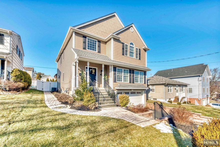 ABSOLUTELY TURNKEY 4 BEDROOM, 2.5 BATH COLONIAL BUILT IN 2017 FOR THE MOST DISCRIMINATING BUYER. THIS HOME, CONVENIENTLY LOCATED TO MAJOR ROADWAYS & TRANSPORTATION, OFFERS TREMENDOUS NATURAL LIGHT W OVERSIZED WINDOWS - FRONT TO BACK EXPOSURE, HARDWOOD FLOORS, OPEN CONCEPT, HIGH CEILINGS, & DETAILED MOULDING THRU-OUT. WELCOMING ENTRY FOYER OPENS TO FORMAL LIVING ROOM W FRONT VIEWS, FORMAL DINING ROOM, CHEF'S STYLE KITCHEN, COZY FAMILY ROOM W ACCESS TO PAVER PATIO/BACKYARD, & POWDER ROOM. SECOND FLOOR OFFERS RETREAT-STYLE MASTER SUITE, 3 WELL SIZED BEDROOMS, FULL HALL BATH, & CONVENIENTLY LOCATED LAUNDRY ROOM. LOWER LEVEL W HIGH CEILINGS OFFERS OFFICE AREA, TREMENDOUS STORAGE, POTENTIAL FOR AWESOME REC ROOM, AND ACCESS TO 2 CAR GARAGE. FULLY FENCED PRIVATE YARD W PAVER PATIO & GRASSY AREA IDEAL FOR OUTDOOR ENTERTAINING. EASY LIVING. LOW TAXES - UNDER $11K. EVERYTHING THAT MAHWAH HAS TO OFFER - SKIING, HIKING, SWIMMING, NATURE TRAILS - WITHIN A MOMENT'S REACH.