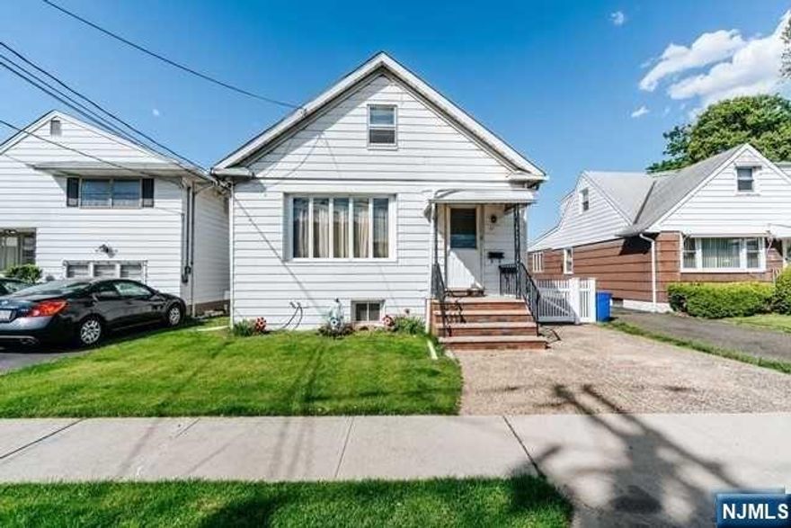 THIS IS A UNIQUE 2 FAMILY. IT CONSIST OF 2 SINGLE FAMILY HOUSES ON ONE LOT.. THE MAIN HOUSE #1)IS IN FRONT AND THE 2ND HOUSE #2)IS IN THE BACK..THE MAIN HOUSE WAS ALTERED TO FIT THE NEEDS OF THE FAMILY, WHICH CONSISTS OF 2 BEDROOMS, LIVING RM, DINING RM, AND A FULL BATH WALK DOWN TO THE FINISHED BASEMENT WHICH FEATURES THEIR KITCHEN, FAMILY RM, FULL BATH AND LAUNDRY AREA..TILES AND HARDWOOD FLOORS THROUGH-OUT. THE 2ND HOUSE CONSISTS OF KITCHEN, LIVING RM, 1 BEDROOM AND A FULL BATH, WITH LAUNDRY HOOKUPS AND STORAGE IN THE UNFINISHED BASEMENT..COME SEE THIS UNIQUE PROPERTY....VERY LOW TAXES!!!!