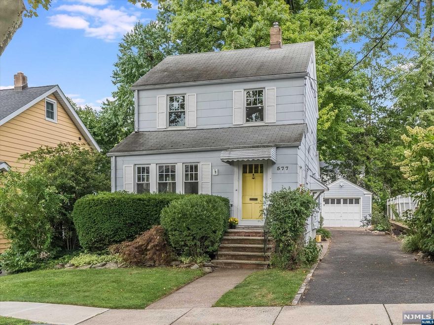 Welcome home to this charming colonial located on a quiet tree lined street in Teaneck.Pass through the sunny entry foyer & step into the home's spacious LR,filled w/plenty of natural light & highlighted by a pair of gorgeous stained glass windows.Beautiful inlaid HW floors flow into a large FDR.The EIK boasts plenty of cabinetry & has sliding glass doors that lead to a lovely screened in porch overlooking the private backyard.The HW floors continue to the 2nd level where there are 2 large BRs w/access to a walk up attic-a semifinished bonus rm ready for your personal touch to fill so many needs!A classic black & white bth completes the 2nd level.The lower level of the home is finished w/a terrific rec rm/home office & offers another full bth,laundry & storage.Addtl features incl central air,detached garage,& a desirable location near downtown Cedar Lane,Phelps Park,Fairleigh Dickinson University,houses of worship,& easy access to Route 4 & NYC trans.
