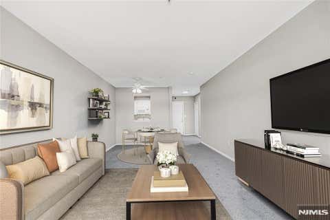 Photo of 905 River RD #329, Edgewater, NJ 07020 (MLS # 26016019)
