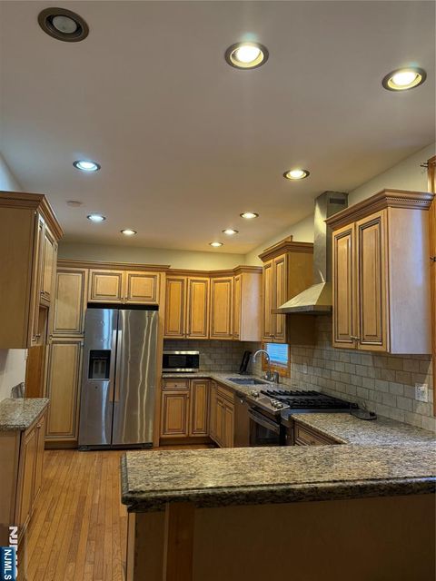 Photo of 70 Charles St #1ST FL, Jersey City, NJ 07307 (MLS # 26005261)