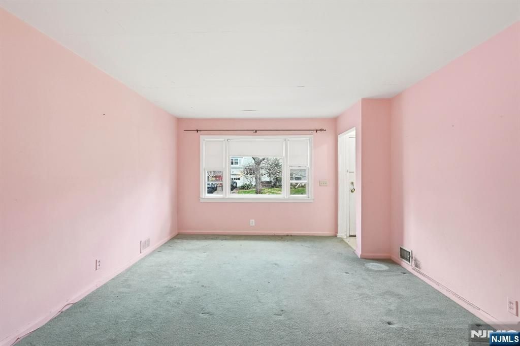 Photo of 25 Hillside Terrace, Livingston, NJ 07039 (MLS # 26011815)