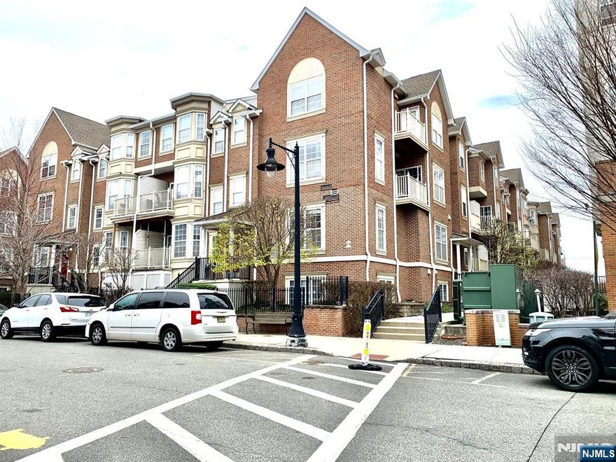 17-yr old Amherst unit with 1310 sf. Upgraded with recessed lighting, marble countertops and SS kitchen appliances. Refrigerator, Dishwasher, Gas range, Microwave, washer & dryer included. LR: 11'8x17, DR: 10X12'2, Kit: 8'1X10'4, BRS: 11'4x14'7 & 16'5x12'2. Loft: 10'4x16. Engineered wood floors & 9' ceiling on 1st level. Carpet on 2nd level. 1 covered parking space. HOA fee: $463.31/mo covers flood insurance. Primary bedroom with ensuite bath. Walk to Path in 12 minutes. Corner unit facing West & South. Balconies in entire community cannot be opened or used. Access to gym/clubhouse/pool & shuttle to path requires annual membership enrollments every November with fees. Buyer to pay $250 move-in fee & $200 moving deposit required by condo association. One domestic pet under 40 pounds is allowed. Within walking distance to Harrison Path Station. Near Rt. 280, Rt. 21, Turnpike, Parkway, NJPAC, Prudential Center, Red Bull Stadium, NJIT, Rutgers, etc. Convenient to shopping, dining, parks and schools. Property taxes: $6,536 a year. Special assessment to cover community insurance increase in 2026 averages $116.21/month. Offers with financing need to be pre-approved by a Portfolio lender with a minimum of 20% down.. Unit has a lease ending on 8/31/2026.