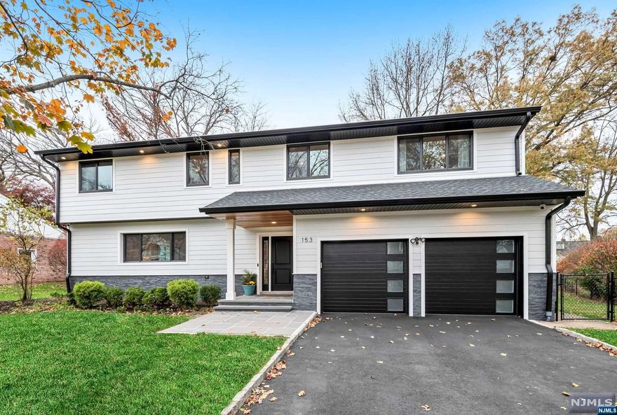 Welcome to this beautiful home, completely gut renovated everything is brand-new! Renovated in 2022, home features 5 bedrooms, 4 bath and 1 half bath, a bright and spacious open layout of dining room, eat in kitchen and hardwood floors throughout, spreads across 3386 sq ft of living space The upstairs living space boasts an ensuite, master bedroom with a walk-in closet and master bathroom, in addition to 4 bedrooms and two bathrooms, and laundry room. This home has easy access to restaurants, schools, place of worship and shopping, perfect for entertaining family and friends. Make this Modern gem yours today! Owner is a licensed Realtor.