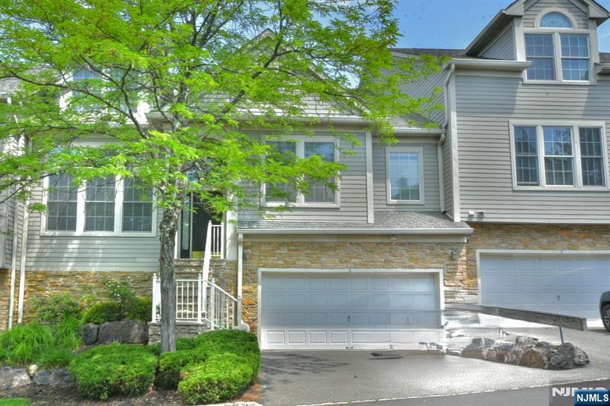 Welcome to 3 Skyview Drive in North Haledon's sought-after Summit Pointe community. Where low-maintenance living meets generous space with an easy commute to New York City, designed for effortless everyday living. The first-floor primary suite means single-level comfort when you want it. With soaring two-story ceilings, a wood-burning fireplace, and a private deck that gives you the feel of a much larger home. The open kitchen, living room, and den flow naturally for both quiet nights in and weekend entertaining. Upstairs, a dramatic loft overlooking the living room below offers the perfect home office or flex space ideal for hybrid work schedules. A fully finished lower level with rec room, office, and 2-car garage rounds out a home that truly has room for everything without the burden of maintaining it. HOA covers landscaping, snow removal, and exterior maintenance year-round. Minutes to Hawthorne and Ridgewood NJ Transit stations with under-50-minute service to New York Penn Station. Easy access to Routes 208 and 202. 3 BD 2.5 BA 2-Car Garage Finished Basement Deck Community Pool & Tennis Built 2004 Please call or text Claudia at (201) 638-0718. for showings or information