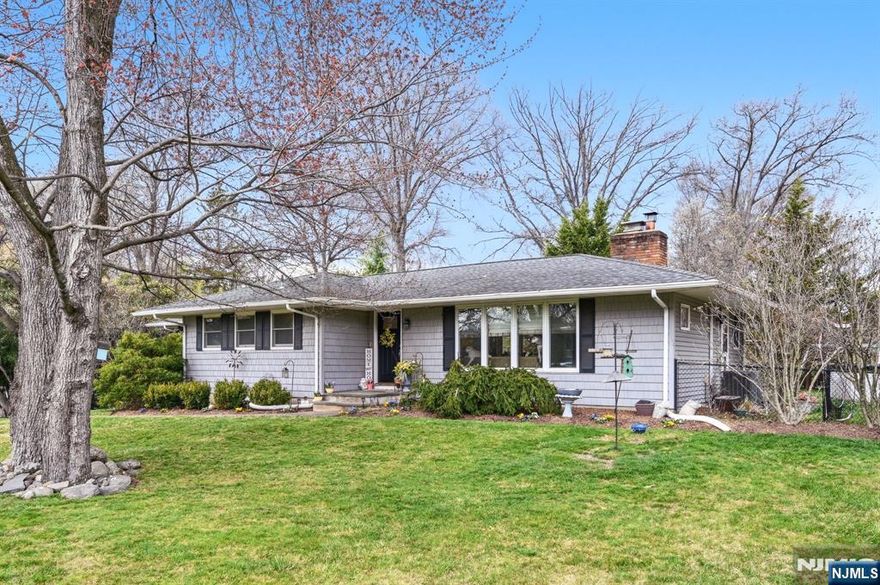 Beautifully maintained four bedroom ranch located in a picturesque neighborhood of North Haledon. The front entry overlooks the open floor plan. Spacious living room with ample natural light, a wood burning fireplace and a sizable nook perfect for an at home office space or reading nook. The dining room has sliding glass doors to the large back patio overlooking the yard. The updated kitchen features beautiful leathered granite counter tops, stainless steel appliances and sleek grey cabinetry. The spacious primary bedroom has two closets and a convenient en-suite bathroom. Three bedrooms, each with double closets are serviced by the main hall bath. A beautifully updated powder room completes the main level. The lower level features a finished basement, laundry room, workshop, ample storage and a one car garage. The expansive backyard includes a patio, play set, above ground pool and vegetable garden. Conveniently located near schools, town, transportation and shopping.