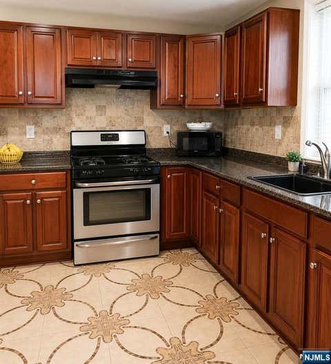 Photo of 1083 Grove Street, Irvington, NJ 07111 (MLS # 26027598)