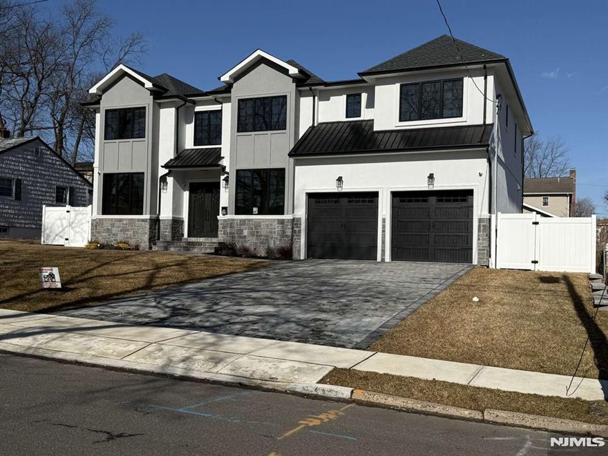 In Bergen County's most desirable neighborhood, close to schools, is this magnificent new home. Enter into a 2 story foyer, to living rm and dining rm to great rm with 20' ceiling and fireplace. Chef's kitchen w/large center Island. high-end Wolf plus Subzero appliances in a huge kitchen + butler's pantry w/ wet bar. Guest Suite w/bath all first floor 10' ceilings. Basement has radiant heat floors throughout with separate Zone + another separate zone for HVAC. Also has wine rm, gym/exercise rm, movie theater and bedroom with full bathroom, big storage close and security system. Second level has the primary suite with full bathroom, plus Junior suite, Jack & Jill bedrooms with full bath. Laundry rm on the 2nd flr. All Bedrooms have ceiling fans. Crown molding throughout. Total of 4 zones heating and 3 zones A/C, 22000 w/ backup generator covering the entire house, connected to natural gas, and it can be switch to propane, sprinkler system, back yard clear of any underground storage