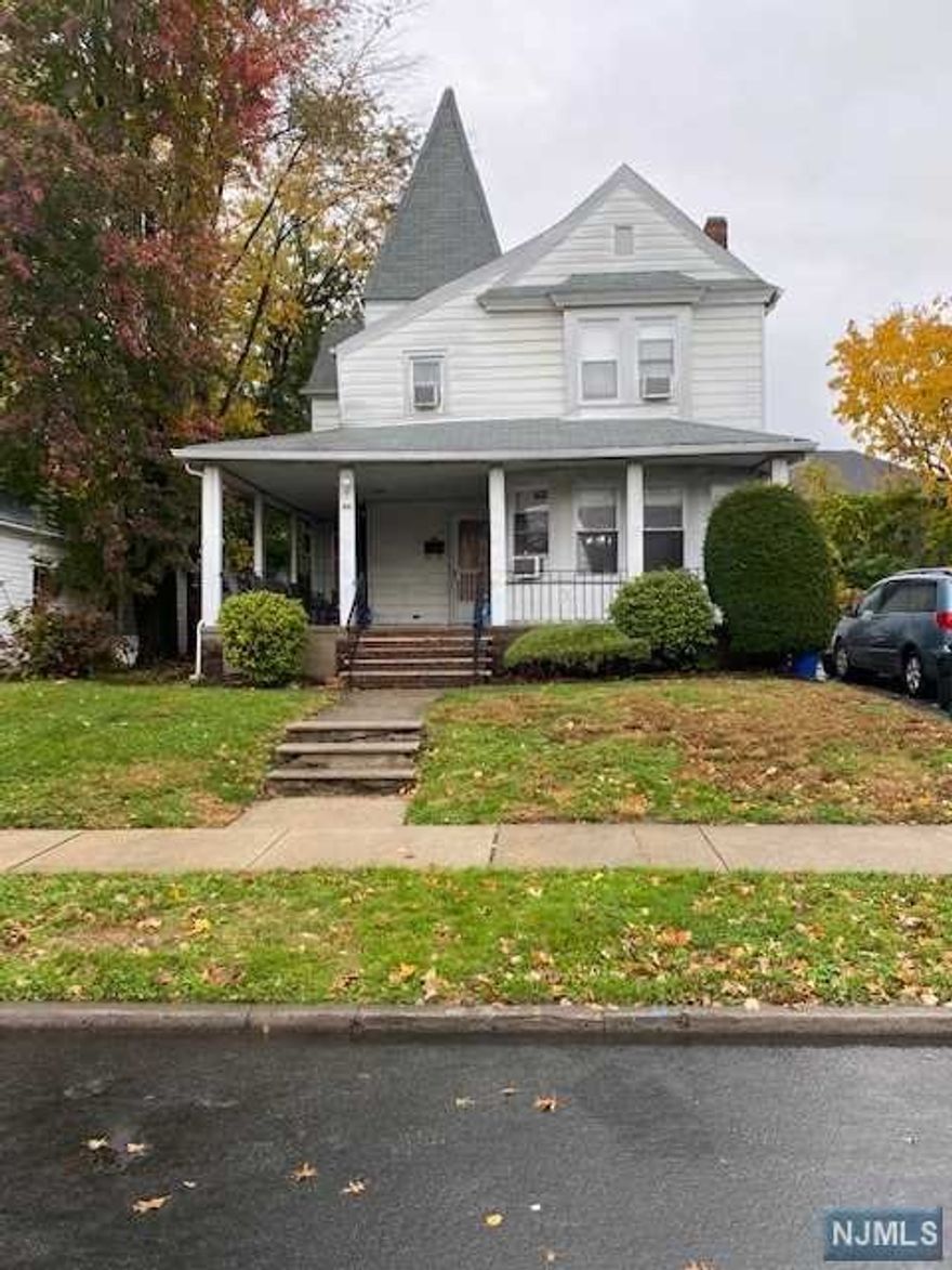 Move in ready colonial features living and dining room and spacious eat in kitchen and 1/2 bathroom on the first floor. Second floor has 3 bedrooms plus an enclosed porch and a full bathroom. Basement is fully finished. Just pack your bags and move in. Near schools, shopping, NYC transportation and houses of worship