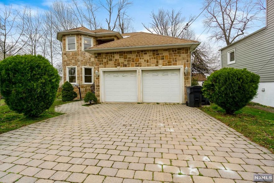 Don't miss this young charming 2596 sq.ft. colonial home. Built in 2007! Gorgeous stone front. Open floor plan with Entry foyer, formal living room, formal dining room, family room with fireplace and sliding door to back yard. Very spacious eat in kitchen with breakfast bar, custom cabinetry and granite countertops. First floor features one bedroom that could easily be an office! Full bath, laundry room and access to oversized 2 car garage. Upstairs boasts master bedroom suite, master bath with jacuzzi tub, walkin closet and your own private access terrace! Plus three good sized bedrooms and a full bath. Unfinished basement waiting to be finished.