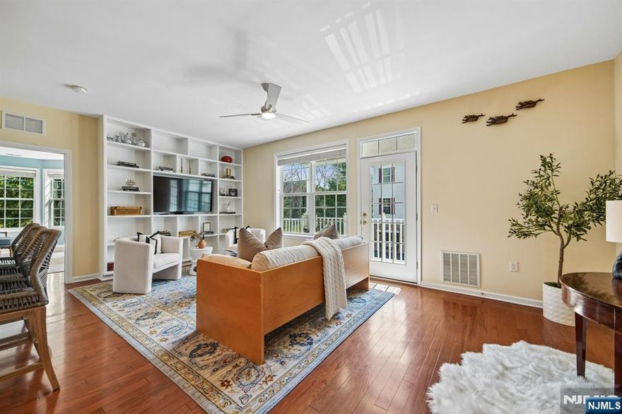 Beautiful Begonia model filled with sunshine and bright, open living spaces! The refreshed kitchen features a new electric stove and cooktop, elegant backsplash, updated hardware, bright new countertops, and cabinetry finished all the way to the ceiling no open gaps for a clean, custom look.The spacious primary suite offers an enormous closet and serene views of the park and trees in bloom. Enjoy your morning coffee on the private terrace overlooking adjacent walking paths and lush greenery.Additional highlights include a private in-unit laundry room, attached first-floor private garage access, and a large storage space.The Four Seasons lifestyle amenities are truly unmatched: craft/card room, billiards room, ballroom, fitness center, indoor pool, terrace room, outdoor pool, bocce courts, tennis courts, and pickleball all set against stunning views of the NYC skyline.