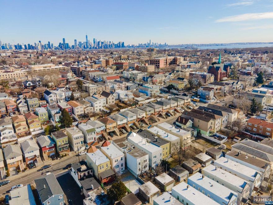 Ideally located in the Greenville section of Jersey City sits this income-producing four unit building. Each unit has two bedrooms, one full bath, kitchen and living room. All utilities except water and sewer are separated. Tenants here 16 years, 14 years, 10 years and 4 years. A diamond in the rough!