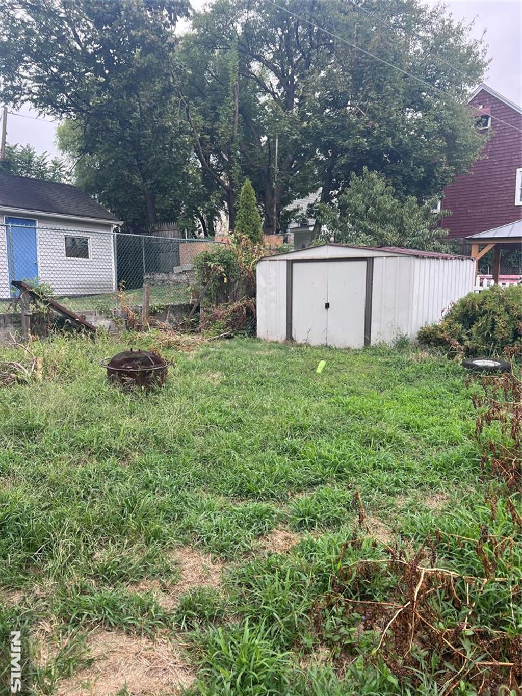 Photo of 12 Spencer Pl, Garfield, NJ 07026 (MLS # 25037298)