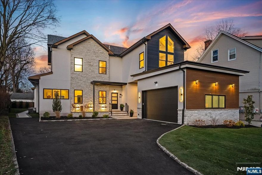 Presenting 36 James Street! Centrally located between Walnut St & Watchung Plaza, this home was just completely rebuilt and thoughtfully designed by local developer Rustic Appeal LLC. Impressive volume & sharp finishes combine to create a true statement residence for your next chapter in Montclair. The heart of the home showcases a dream kitchen w/ GE Cafe appliances, 8' center island and views of the entire 1st Floor. All complemented by an additional built-in breakfast nook, huge walk-in pantry, dry bar, and seamless access to the outdoor patio. More intimate spaces are layered in, with the vaulted ceiling TV room and 1st floor guest suite w/ bedroom, full bath & office. Upstairs, you'll find the breathtaking, south facing leisure room, w/ 16' ceilings, flooded with natural light from AM to PM. The 2nd floor continues to impress with a stunning primary suite with 16' ceilings, two more beds with J&J bath and a laundry room decked out w/ cabinet storage, generous counter space, separate sink, and its own closet. The lower level offers a versatile rec room, w/ a full bath and space for a second office. Outside, the house perks continue with a 2-car garage w/ 11' ceilings + EV charger, a lush backyard w/ new perimeter fence, irrigation system, and a covered walk-out from the basement. All while being less than 1 mile from 2 train stations, the vibrant Van Vleck gardens & Edgemont Park, and a delightful array of restaurants, bars, cafes, shops and so much more! Perfection!