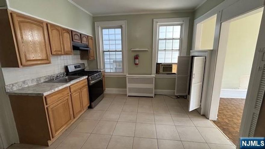 One bedroom apartment unit located on 2nd floor offering a spacious bedroom with a walk in closet, living room plus eat in kitchen. Owner provide refrigerator and stove. Window Air conditioning. Very bright unit. Available now. Tenant pays own utilities. Full application, proof of ability to pay rent, proof of identity. Launddromate accross the Street