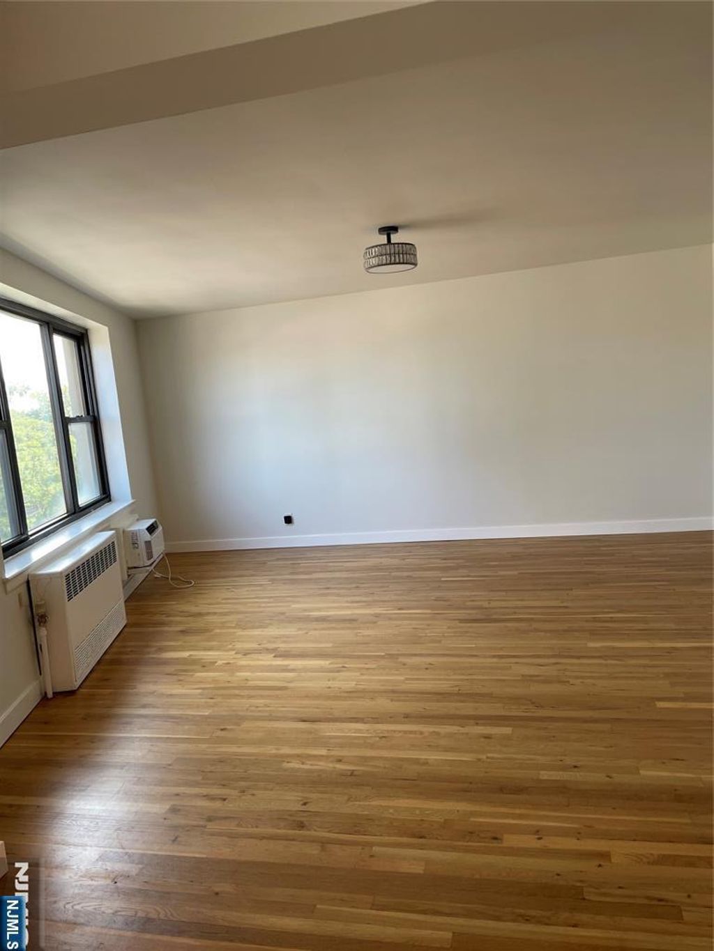 Photo of 1541 Lemoine Avenue #4F, Fort Lee, NJ 07024 (MLS # 25028528)