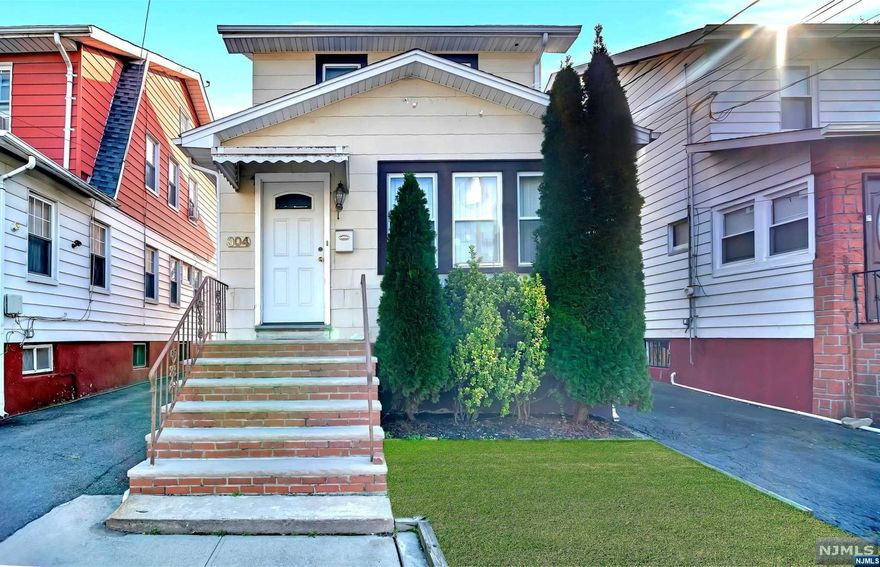 Exquisite Colonial Home with Timeless Charm! This beautifully renovated colonial residence is a gem in a serene, quiet neighborhood. Boasting four generously sized bedrooms and two full baths, this home provides ample space for comfort and relaxation. Adorned with hardwood floors throughout, every step inside exudes warmth and elegance. Entertain or unwind in the spacious living areas, adorned with natural light and designed for modern living. The kitchen offers functionality and style, perfect for culinary enthusiasts. A large rear yard complements the home, offering a private retreat for outdoor gatherings or peaceful introspect. A notable feature is the convenience of a one-car garage, providing secure parking and additional storage and the finished basement. This property truly encapsulates the essence of comfortable living in a serene and inviting environment.