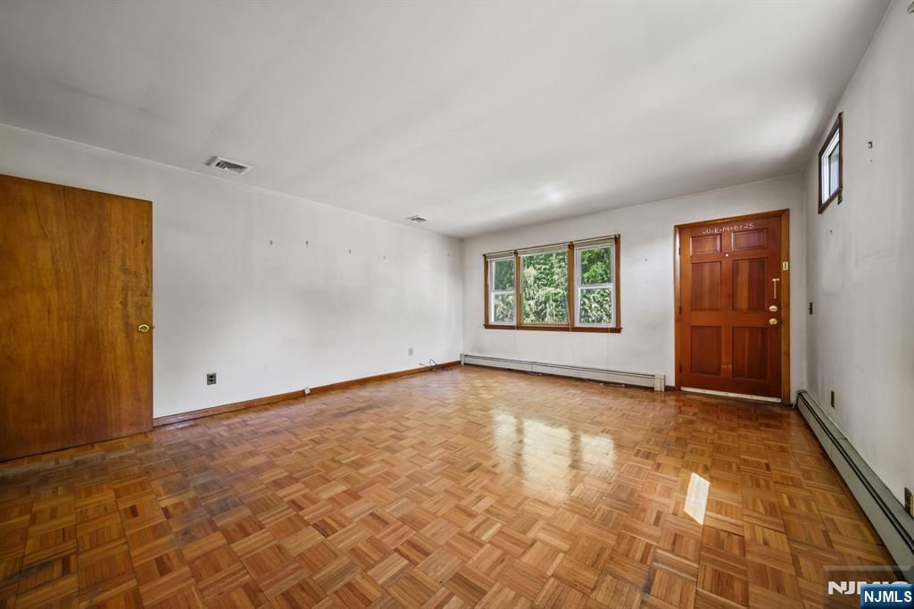 Photo of 304 Gilbert Avenue, Elmwood Park, NJ 07407 (MLS # 26016172)