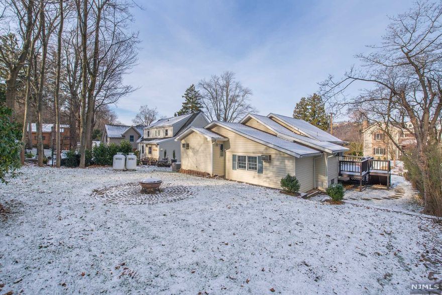 Charming Lake Mohawk cottage! Experience all the amenities of year round lake living! Just a short walk to the beach, boat slip, fishing, swimming, ice-skating or choose just to relax on the deck. Cross the street to the lakefront on this quiet side street! Enjoy all the advantages of 1 floor living. Lake style bungalow with seasonal views & tons of upgrades! Stainless steel appliances, new roof, refinished HW floors & freshly painted. The amount of flexible living is impressive. Lovely backyard with a fire-pit! Perfect for entertaining. 2 generous bedrooms & 2 full baths. Lots of room to fit your lifestyle. Basement adds to its spaciousness & organization. Tons of storage! Enjoy all the amenities of Lake Mohawk Country Club- in addition to the beaches & lake activities, they offer a yacht club, tennis, golf courses & pool! The quaint downtown and boardwalk hosts a ton of great boutiques, restaurants & the prettiest Tudor style shops. Top Sparta schools.