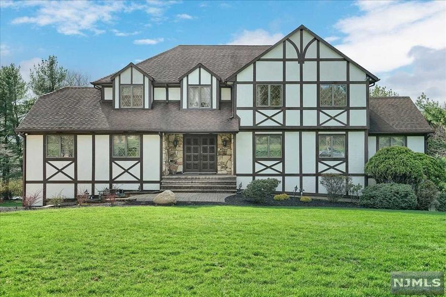 Welcome to this wonderful 4/5 bedroom 3 full bathroom colonial in one of the most beautiful areas of Mahwah. Lovingly cared for,this home features amazing space & almost an acre of property.2 story entry leads to a 1st floor office space w/built-ins.Step down to a huge living rm & banquet sized dining rm.Lrg eat-in kitchen w/granite & entry to a composite deck overlooking the yard w/an in-ground heated pool.Family rm w/wood plank flrs & wood burning fireplace.Full bthrm, lndry rm & den/potential 5th bedrm complete the 1st level.The upper level boats a huge primary bedrm suite w/2 walk-in closets,enormous primary fullbthrm w/jetted tub,stall shower,sauna & double sinks.3 addit'l generously sized bedrms w/lots of closets & a full bthrm.Lrg finished walk out lower level w/high ceilings,full bthrm & summer kitchen.Home features a water softer/filtration system,newer hot water heater,sprinkler system,central vac & wood flrs.Endless possibilities,wonderful opportunity for its new owner!