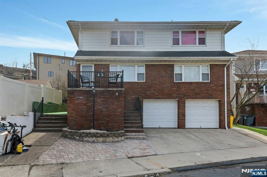 Excellent investment opportunity in the heart of Fairview! This well-maintained multi-family home at 2 Carlen Court features two spacious units, each offering a comfortable layout with abundant natural light. Both units include a living room, kitchen, three bedrooms, and a full bath, with wood and tile flooring throughout. The first unit is enhanced by a fully finished basement complete with a kitchenette, full bathroom, and walk-out accessâ€”ideal for extended living or added flexibility. A two-car garage with separate washer/dryer hookups for each unit provides added convenience, along with separate electric utilities. Ideally located near public transportation, shopping, schools, and major highways, this property presents a fantastic opportunity for investors or owner-occupants seeking rental income in desirable Bergen County. House is being sold As-Is.