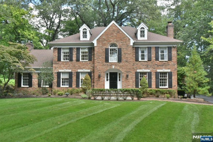 Spectacular 5 BR/3FB/1HB brick front colonial on quiet, cul-de-sac street situated on beautiful, private professionally landscaped property, embedded in a neighborhood with close proximity to the center of town, shops and train. Expanded and updated, this spacious home boasts an updated gourmet kitchen w/top of the line appliances incl Wolf SubZero & Miele, farm sink, center island, bar area w/beverage fridge, spacious breakfast area and French door access to outdoor patio for easy entertaining, including speakers inside and out. Large 2-story great room/fpl, elegant formal living room and dining room/fpl. Updated mudroom incl powder room, back pantry/closets & access to 2 car attached garage and 2nd stair to basement. True 5 BRs on the 2nd fl plus a bonus rm, including large primary bedroom suite w/WIC, updated spa-like private bath w/dbl vanity, and French doors to balcony overlooking great rm. 4 additional bedrooms, 2 hall baths, convenient updated laundry room and 2nd floor bonus room w/wet bar/gas fpl, as well as separate staircase to driveway/backyard complete this upper level. Plenty of lower level storage or potential for addl finished space. Newer Furnace/chimney liner (2024), HWH (2021) & AC units (2019). Enjoy all that Allendale has to offer including award winning schools, beautiful parks and recreation. Just move right in and enjoy!