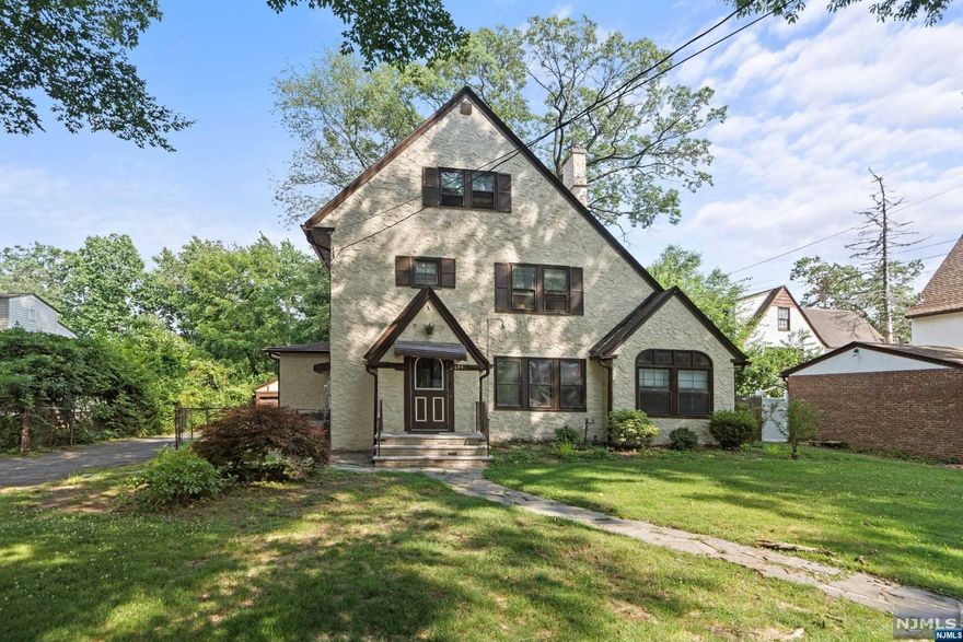 Welcome to your dream home! This stunning 5-bedroom house is a true gem nestled in the highly desired SEVEN OAKS neighborhood, this house offers an inviting ambiance that will instantly make you feel at home. Upon entering, you'll be captivated by the character-rich details, including the original hardwood floors and crown molding that have been lovingly preserved. The spacious kitchen is a chef's paradise, providing the perfect space to whip up culinary delights. This home was designed with comfort and functionality in mind. The living room is perfect for cozy evenings by the fireplace, while the adjacent dining room offers a delightful setting for hosting memorable gatherings. With 3 full bathrooms and 1 half bathroom, morning routines will be a breeze. The partially finished basement presents endless possibilities and the outdoor space is equally enchanting, featuring a beautifully landscaped backyard. This home Qualifies for Community Advantage Loan Program.