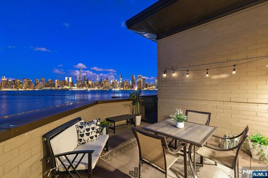 Rare waterfront townhouse offering 3,050 sq ft of expansive living space with northeast-facing views of the iconic NYC skyline, including Hudson Yards and the Empire State Building. This exclusive Port Imperial residence blends the space and privacy of a single-family home with the allure of waterfront living. With generously sized rooms, high ceilings, and large windows that capture stunning city and river views, the home offers endless possibilities to create a personalized luxury retreat. Enjoy multiple private outdoor spaces, including balconies and a rooftop terrace overlooking the skyline. A rare attached 2-car garage adds convenience and completes this exceptional offering. 1 Oxford Landing is a proud member of Henley On Hudson, a well-manicured, community of luxury homes whose amenities include a concierge, swimming pool, 2 fitness centers, playroom & lounge. Residents relish the direct access to the New York waterway and unparalleled views of The Greatest City in the World.