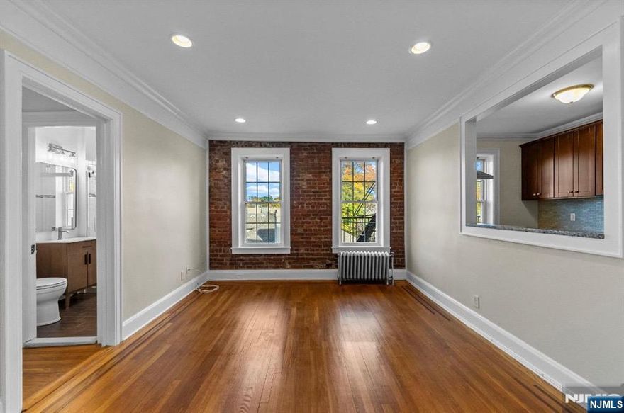 Beautiful 1-bedroom condo located in the sought-after Tudor Hall, a gated community in Englewood with a stunning landscaped courtyard. This third-floor unit features hardwood flooring throughout the living space, a renovated kitchen, and an updated modern bathroom. Ideally situated near Englewood Hospital, downtown shopping, dining options, and major highways for easy commuting.