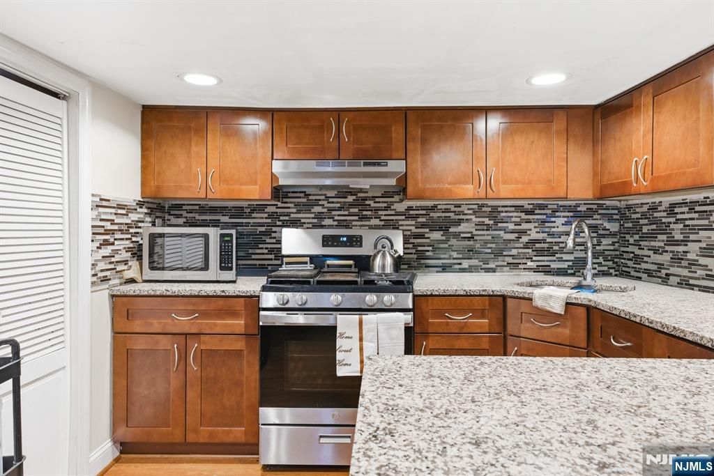 Photo of 65 Cambridge Street, East Orange, NJ 07018 (MLS # 26013910)