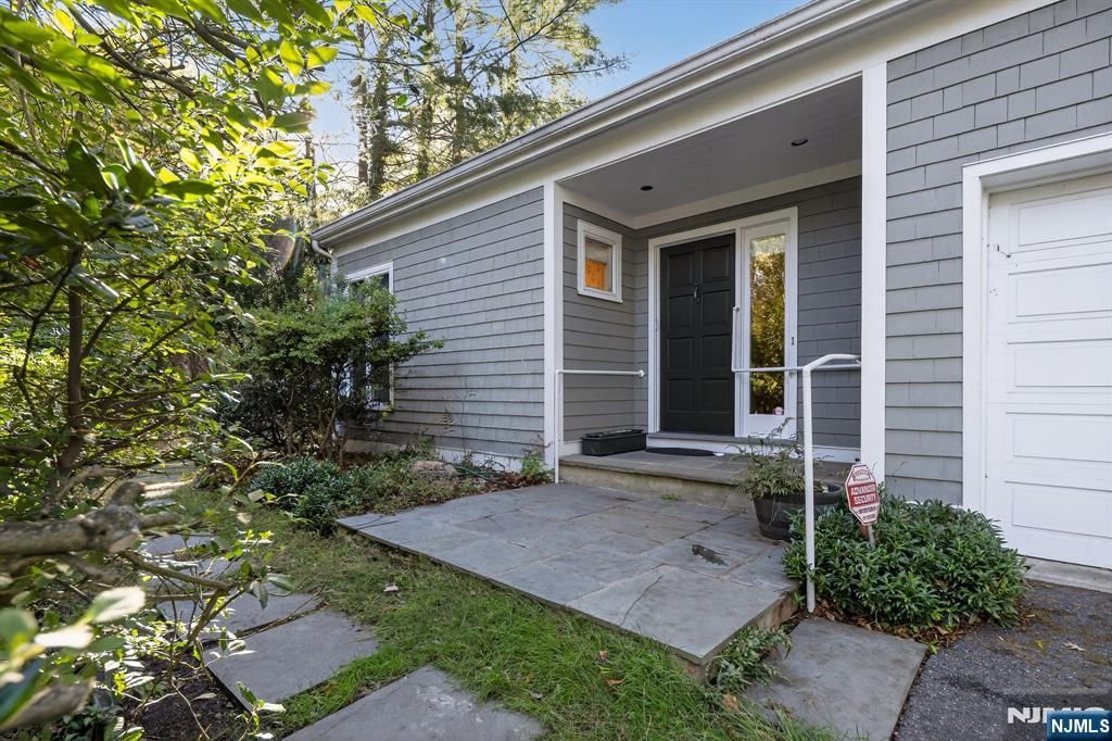 Photo of 180 Glenwood Road, Englewood, NJ 07631 (MLS # 25037420)