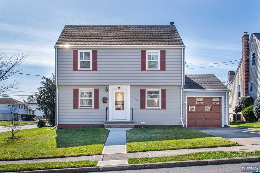 Located in the highly sought after Richfield section of Clifton, approximately 15 miles to New York City, this home is the perfect lifestyle balance of quiet and convenience. This colonial boasts a traditional yet versatile floor plan, offering spacious living areas that cater to both casual living and entertaining. The heart of the home, the kitchen, is equipped with all brand new stainless steel appliances and plenty of storage, making it a delight for those who love to cook and entertain. Adjacent to the kitchen lives a three seasons room, the perfect bonus room. A formal dining room awaits, ready to host memorable dinners. Gorgeous hardwood floors throughout the home. Upstairs, the private living quarters offer spacious sized bedrooms. The bedrooms are generously sized, each providing a cozy haven with ample closet space. Close proximity to NYC transportation, shopping, dining, and low taxes!