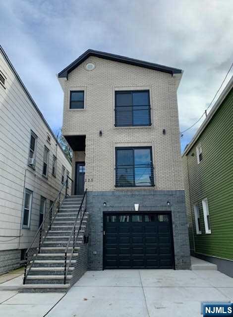 Rental Property at 215 John  1F G , Harrison, New Jersey - Bedrooms: 3 
Bathrooms: 3 
Rooms: 8  - $3,500 MO.