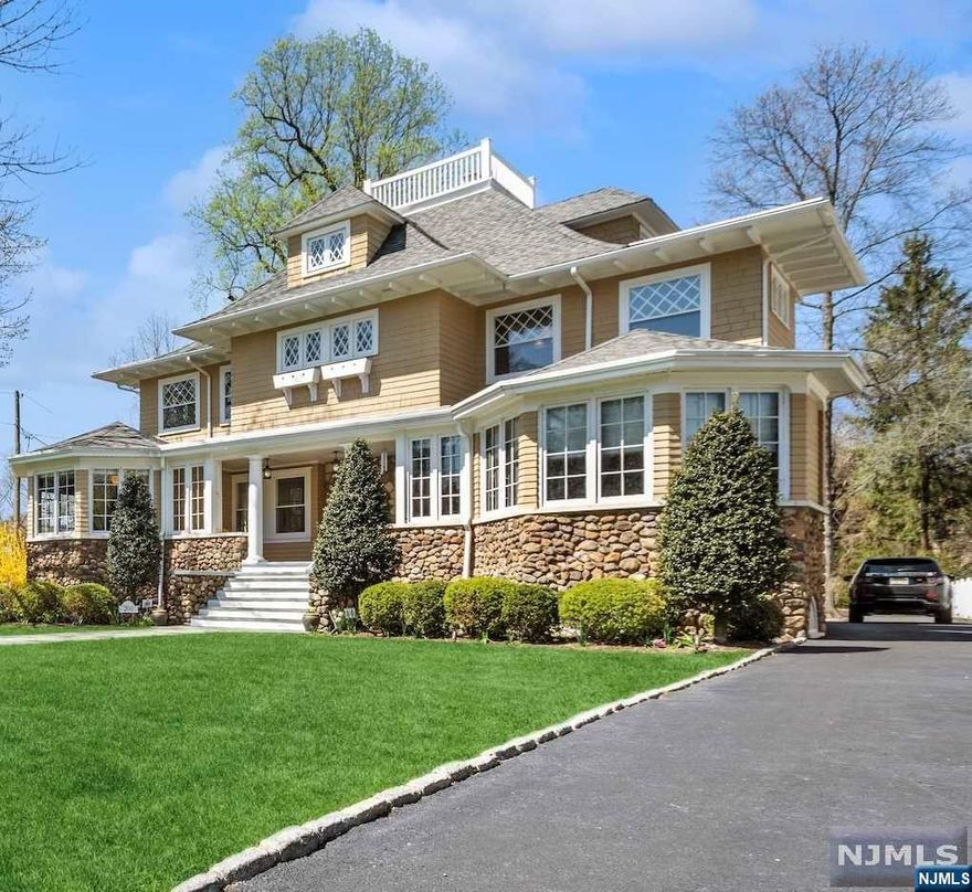 This house is what you moved to Montclair for! A prime location, this Berkshire-style side hall col is loc steps from Watchung Plaza & the Manhattan Direct Train. Bathed in sunlight, the graceful interiors of this 5BR 3.2 Bth feat coffered ceilings, original moldings, & wood floors throughout. The 1st flr feat a chef's kit w/ a lg center island opens to the FR & a wraparound deck overlooking the backyard. A formal LR & paneled DR w/ soaring ceilings make are the perfect backdrop for entertaining. Working from home is a pleasure 2 offices featuring three walls of mullioned windows. A half bath & a lg lndry & mudrm complete the 1st floor. In the basement a lounge & custom temp-cont wine cellar are at your disposal. The 2nd floor includes a primary suite w/ walk-in California closets, 2 BR, and bthrm w/double vanity. On the 3rd floor, a fbth w/ skylight, a guest rm & lg playrm. The deep half-acre flat yd (perfect for a pool) incl a tree house + a 2-car garage w/ a finished studio.
