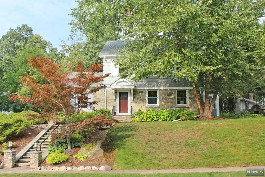 Premier Location, Two Blocks From Glen Ridge, This House Sits At The Crossroads Of Essex Avenue & Cambridge Road, Which Showcases This Beautiful Three Bedroom, 1.5 Bath Home From All Others! A Large Corner Lot, Measuring 120 x 158, W Natural Stone Wall, Offers Tremendous Curb Appeal & Plenty Of Back Yard & Side Yard Space For Outdoor Entertaining! This Stone-Front Colonial Boasts VALUABLE Updates Including: NEWLY Painted Exterior & New Shutters, Brand New Front Doors, Newer Roof (2020), Freshly Painted Bedrooms, Hardwood Floors Sanded, New Kitchen Faucet, Heating Updated, Basement Freshly Painted W New Flooring Creating Large REC ROOM & PLAY/OFFICE Area! Gourmet Kitchen W Viking Stove Opens To Large Dining Room. Stone Fireplace In Living Room. Updated Baths. Mostly New Windows! Bus & Train Nearby.