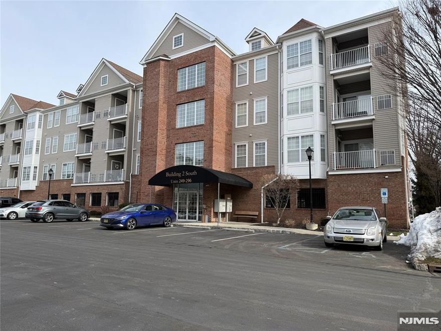 Welcome to this sophisticated 4th-floor corner residence, 55+ Loving, where modern elegance meets effortless one-level living. This sun-drenched home features a desirable open-concept layout highlighted by laminate wood floors and a designer kitchen equipped with granite countertops, stainless steel appliances, a breakfast bar, and a massive laundry/pantry room. The expansive living area, anchored by a charming bow window, flows seamlessly to a private, tranquil balconyâ€”the perfect spot for your morning coffee. The primary suite is a true retreat, boasting a private full bath and generous storage, including two walk-in closets. A spacious second bedroom and additional full bath offer the perfect setup for guests or a home office. 55+ Living Condo!