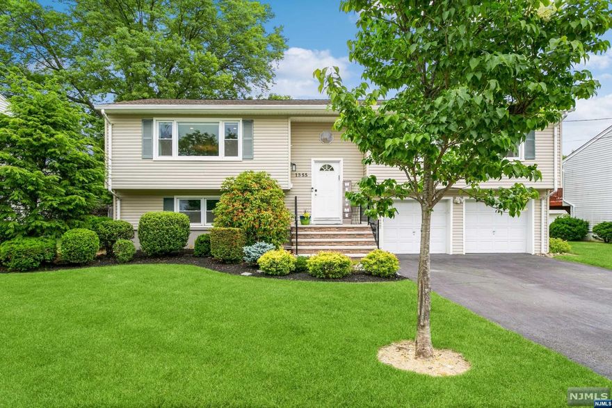 Stunning Bi-Level home with four bedrooms, three full bathrooms, and an attached two-car garage sits on a manicured lot on a tree-lined street. The charmingly landscaped front entry welcomes you inside to hardwood floors gleaming across an open layout on the main level. The large living room flows to the formal dining area and a gorgeous eat-in kitchen. Sliding glass doors bring in lots of light and open to a large deck overlooking the private back yard. The main level continues to the primary bedroom with an en suite bathroom, two additional bedrooms, and a full hall bathroom. Downstairs is a fourth bedroom, a full bathroom, laundry room, French doors leading you to a large family room that could be used as a 5th bedroom with sliding glass doors to the ground-level patio and pool. To top it all off, thanks to this property's ideal location, you have proximity to world-class shopping malls, well-regarded schools, many diverse restaurants, golfing, and major highways