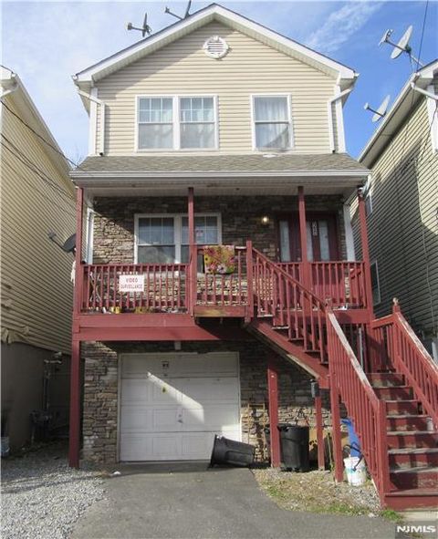 Photo of 28 Highland Street, Paterson, NJ 07524 (MLS # 25043077)