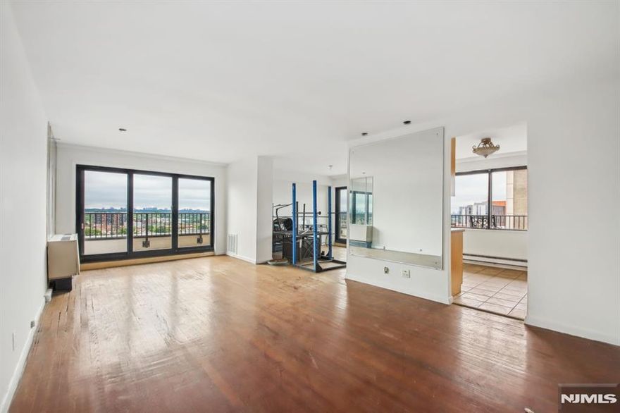 Approximately 1,800 square feet, this four-bedroom, three-bathroom condominium offers an exceptional living experience. The unit features 24-hour security, providing residents with a heightened sense of safety and peace of mind. Common areas and amenities, including a doorman, elevators, and an exercise room, cater to the needs and convenience of the community. On-site management ensures the smooth operation and maintenance of the property. Residents can also take advantage of secure storage space and the availability of a FT handyman, ensuring their needs are promptly addressed. Unit needs some TLC. This well-appointed condominium presents an ideal setting for those seeking a comfortable and well-managed living environment. Balcony wraps around with stunning views of the Ramapo valley all the way to NYC! 2 covered parking spaces ($80 each monthly fee). Close to parks, restaurants, shops, houses of worship, NYC transportation and walking distance to Hackensack hospital.