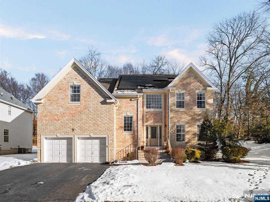 Nestled in The Fairways at Soldier Hill with no HOA, this brick-faced gem in beautiful Emerson, NJ, offers refined living on a spacious lot. The home features four bedrooms, including a primary suite with a walk-in closet, three full baths, and a half bath on the first floor. The main level includes a living room, dining room, and a spacious eat-in kitchen. The family room opens to a deck, perfect for entertaining. A grand foyer with high ceilings welcomes you. Upstairs, youâ€™ll find the primary suite plus three bedrooms and another full bath. The finished basement offers a full bath and flexible space for a game room or office. The large two-car garage completes this Bergen County golfers dream home.